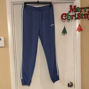 Adidas Women's Blue Joggers with White Stripes
